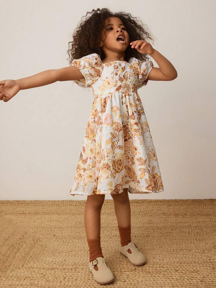 Abito da ragazza con motivo floreale, scollo quadrato e maniche a palloncino