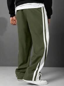 Manfinity Homme Pantalones rectos con rayas laterales, bolsillos y cintura con cordón para tallas grandes
