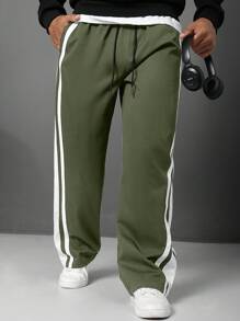 Manfinity Homme Pantalones rectos con rayas laterales, bolsillos y cintura con cordón para tallas grandes