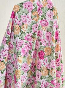 SHEIN Robe mi-longue de maternité nouée à l'avant avec imprimé floral, parfaite pour les vacances