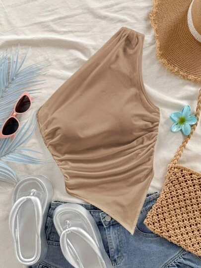 Soleia Blusa con cuello asimétrico y bajo asimétrico en color caqui, adecuada para vacaciones de verano