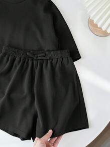 SHEIN LMoss Kids LMoss Tween Girl Music Festival Woven Solid Color Round Neck Short Sleeve T-Shirt And Shorts Set