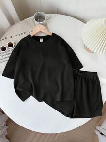 SHEIN LMoss Kids LMoss Tween Girl Music Festival Woven Solid Color Round Neck Short Sleeve T-Shirt And Shorts Set