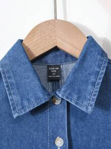 女童休闲宽松牛仔衬衫，前短后长设计，甜美可爱的蝴蝶装饰，简约时尚百搭，适合日常穿着