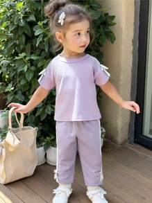 2 Stücke/Set Kleinkind Mädchen lila Kurzarm Top und Hose Lässig Sportanzug, verziert mit Schleife und Schleife, geeignet für Kleinkind Mädchen im Sommer, vielseitig kombinierbar
