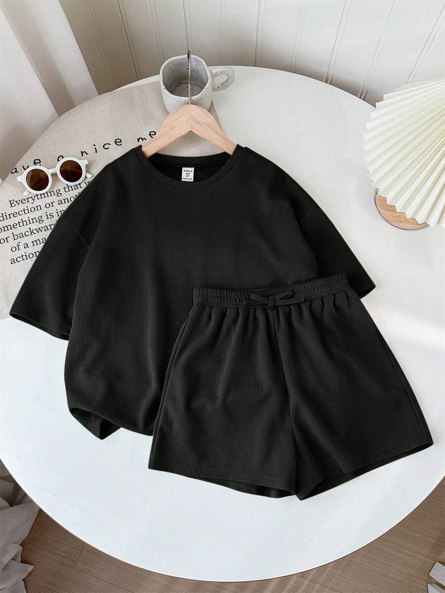 SHEIN LMoss Kids LMoss Tween Girl Music Festival Woven Solid Color Round Neck Short Sleeve T-Shirt And Shorts Set