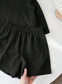 SHEIN LMoss Kids LMoss Tween Girl Music Festival Woven Solid Color Round Neck Short Sleeve T-Shirt And Shorts Set