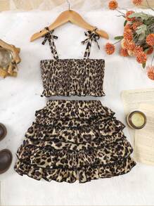 SHEIN Set de 2 piezas de top con tirantes y falda casual con estampado de leopardo y volantes para niña joven