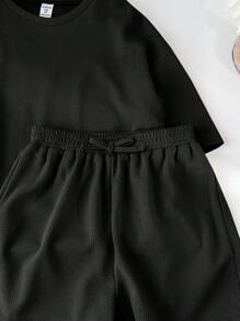 SHEIN LMoss Kids LMoss Tween Girl Music Festival Woven Solid Color Round Neck Short Sleeve T-Shirt And Shorts Set