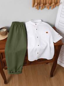 2 stuks kinderkleding voor jongens in Koreaanse stijl met ronde hals, korte mouwen, effen kleur, opgestikte zak en losse rechte broekspijpen. Geschikt voor school, tuin, strand, verjaardag, lente/zomer/herfst/winter.