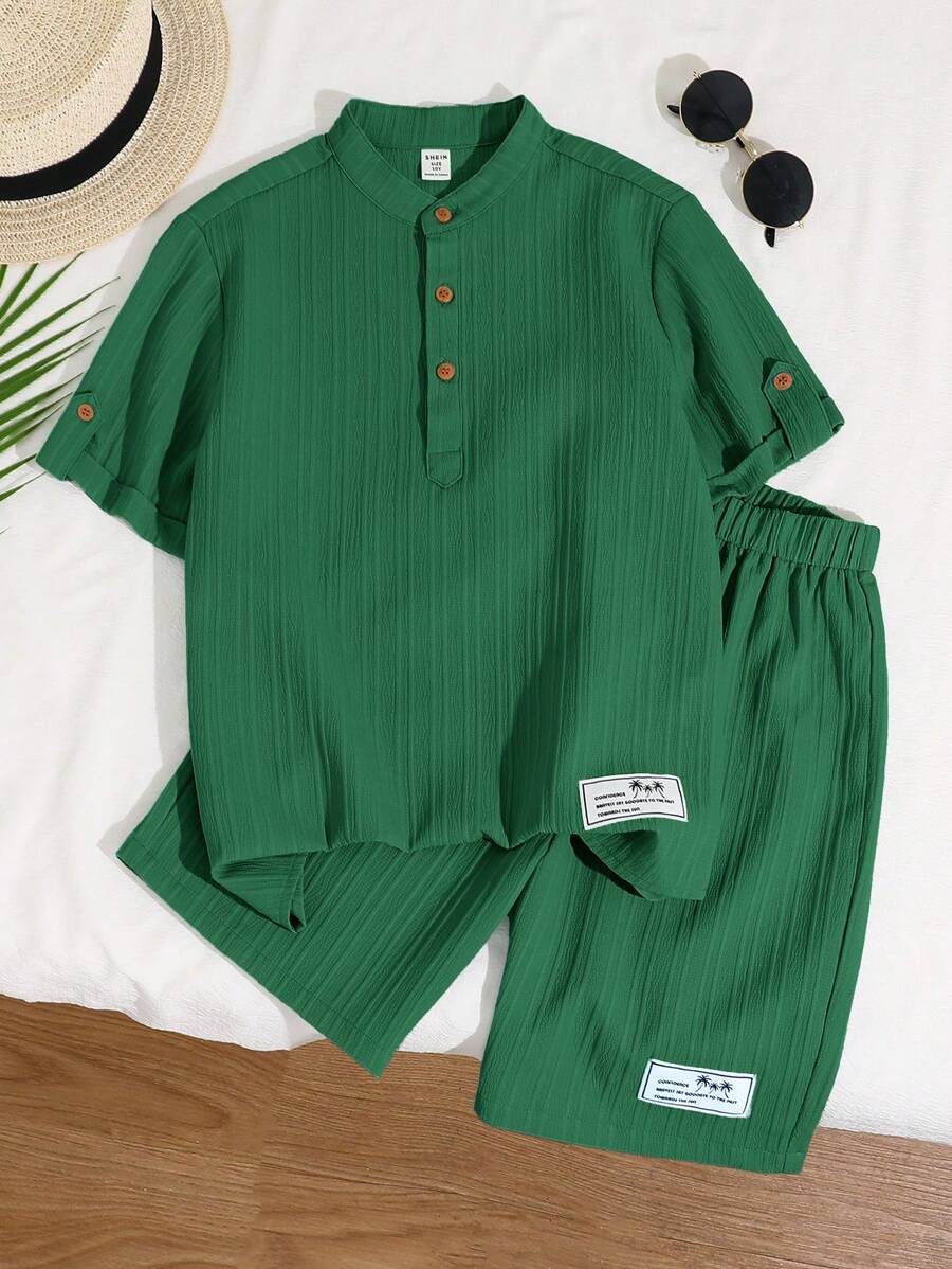 SHEIN LMoss Kids Tween Boy Casual Vacation Stand Collar Half Placket Short Sleeve Top And Patch Shorts Woven Wave Two Pieces Set - Green - View 1