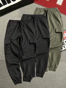 Manfinity Homme Einfarbige Cargo-Hose mit Kordelzug in der Taille, figurbetonter Passform, plissiert, mit mehreren Taschen, lässig, Herbstkleidung