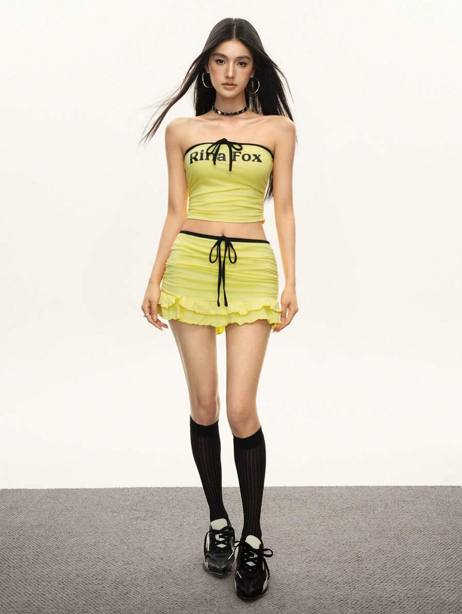 Rina Fox 俏皮字母印花撞色吊带背心短款上衣和荷叶边系腰迷你裙套装，时尚合身