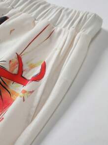 Manfinity EMRG Painting Print Casual Men T-Shirt Set,Men's Mature And Casual Loose Short-Sleeved T-Shirt Set, With Contrasting Green And Apricot Colors On The Top And Bottom, And Personalized Patterns On The Chest And Shorts, Full Of Fashion Sense. The Overall Style Is Avant-Garde And Bold, Showing A Unique Street Fashion Atmosphere, Suitable For Outdoor Sports And Leisure Occasions.