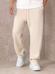 SUMWON Pantalón de chándal premium con pretina caída, números de equipo y detalles, cómodo ajuste para hacer ejercicio y uso casual en todas las estaciones