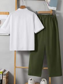 2 stuks kinderkleding voor jongens in Koreaanse stijl met ronde hals, korte mouwen, effen kleur, opgestikte zak en losse rechte broekspijpen. Geschikt voor school, tuin, strand, verjaardag, lente/zomer/herfst/winter.