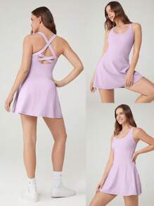 GLOWMODE Vestido activo con pantalones cortos incorporados, bolsillos laterales, agarre antideslizante y escote de tipo pico con tirantes cruzados en la espalda, diseño transpirable y de secado rápido "FeatherFit ™-Air" pensado para ganar, adecuado para tenis, golf, pickleball y uso diario