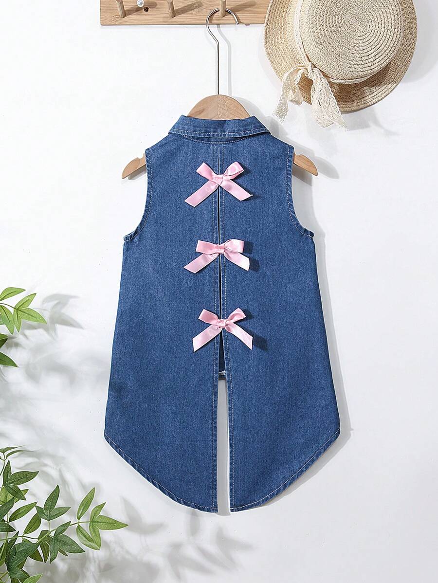 女童休闲宽松牛仔衬衫，前短后长设计，甜美可爱的蝴蝶装饰，简约时尚百搭，适合日常穿着