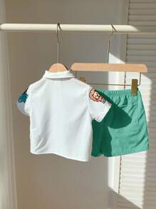 SHEIN Bộ 2 món/Bộ đồ cho bé trai/bé gái dễ thương họa tiết hoạt hình áo sơ mi tay ngắn và quần short kaki cạp chun, mùa hè - Nhiều màu - Xem 2
