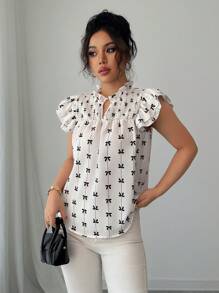 Chiquease Women's Butterfly Print V-Neck Ruffle Hem Hollow Out A-Line Blouse - White - View 1