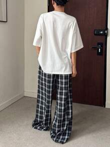DAZY Conjunto de pijama para mujer con Top de camiseta con estampado gráfico y pantalón holgado y recto a cuadros