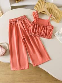 SHEIN Nuevo conjunto de moda de fiesta juvenil, incluye top sin mangas con volantes en tono rosa pálido y pantalones anchos de cintura alta, top con recorte floral + pantalones largos, conjunto asimétrico de hombro para playa y vacaciones para niña joven