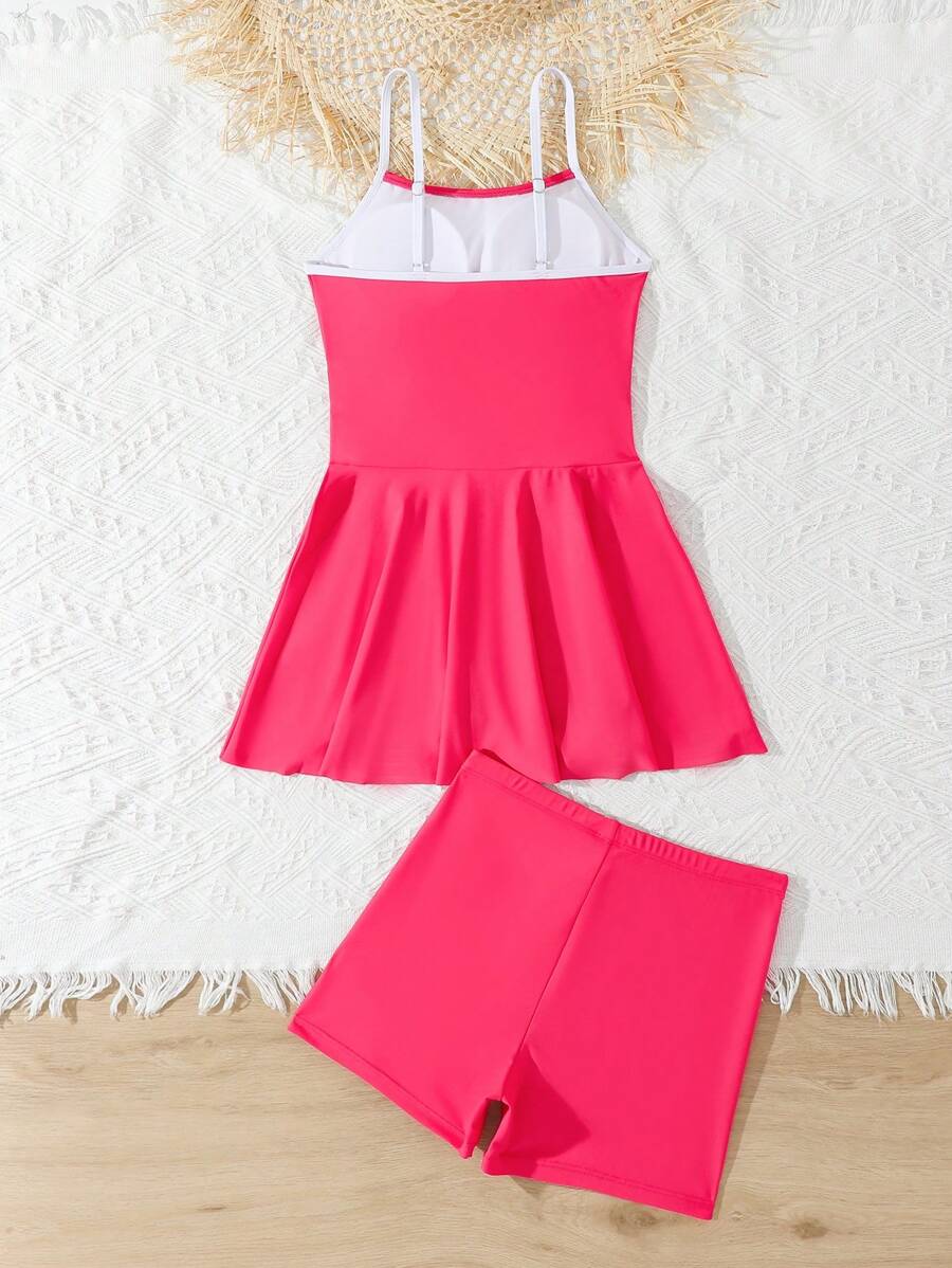 SHEIN Conjunto de traje de baño tipo tankini para niñas preadolescentes con parches en blanco y negro, recortes y vestido de baño de longitud media con tirantes, y calzoncillos de natación - Multicolor - Ver 1