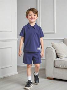 SHEIN Set de 2 piezas con camisa polo de manga corta y color liso + shorts para niño, informal