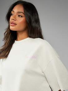 Missguided x Playboy Oversized Cropped Athletic T-Shirt Loungewear Casual Relaxed Fit Spring Summer Workout Weekend Comfort Athleisure Wear