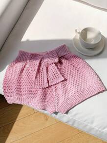 Comfortcana Shorts in stile vacanza al mare, a vita bassa, lavorati a maglia, con motivo a fiocco e design traforato