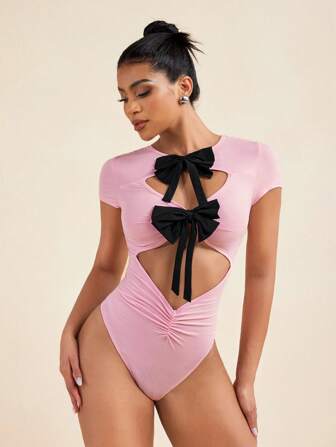 LUNA B 粉色和黑色蝴蝶结镂空短袖甜美紧身裤浪漫沙滩装波西米亚度假紧身衣