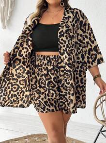 SHEIN CURVE+ Bộ 2 món cỡ lớn: Áo sơ mi dài tay họa tiết da báo và quần short, tối giản và thời trang, phù hợp cho mùa hè, đường cong cỡ lớn, trang phục đi biển theo phong cách Boho dành cho nữ/bãi biển/trang phục đi nghỉ ở bãi biển/đồ dùng cần thiết cho bãi biển/váy tốt nghiệp/váy tiệc trà - Nhiều màu - Xem 4