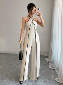 Elenzga Women's Flared Leg Surplice Neck Jumpsuit