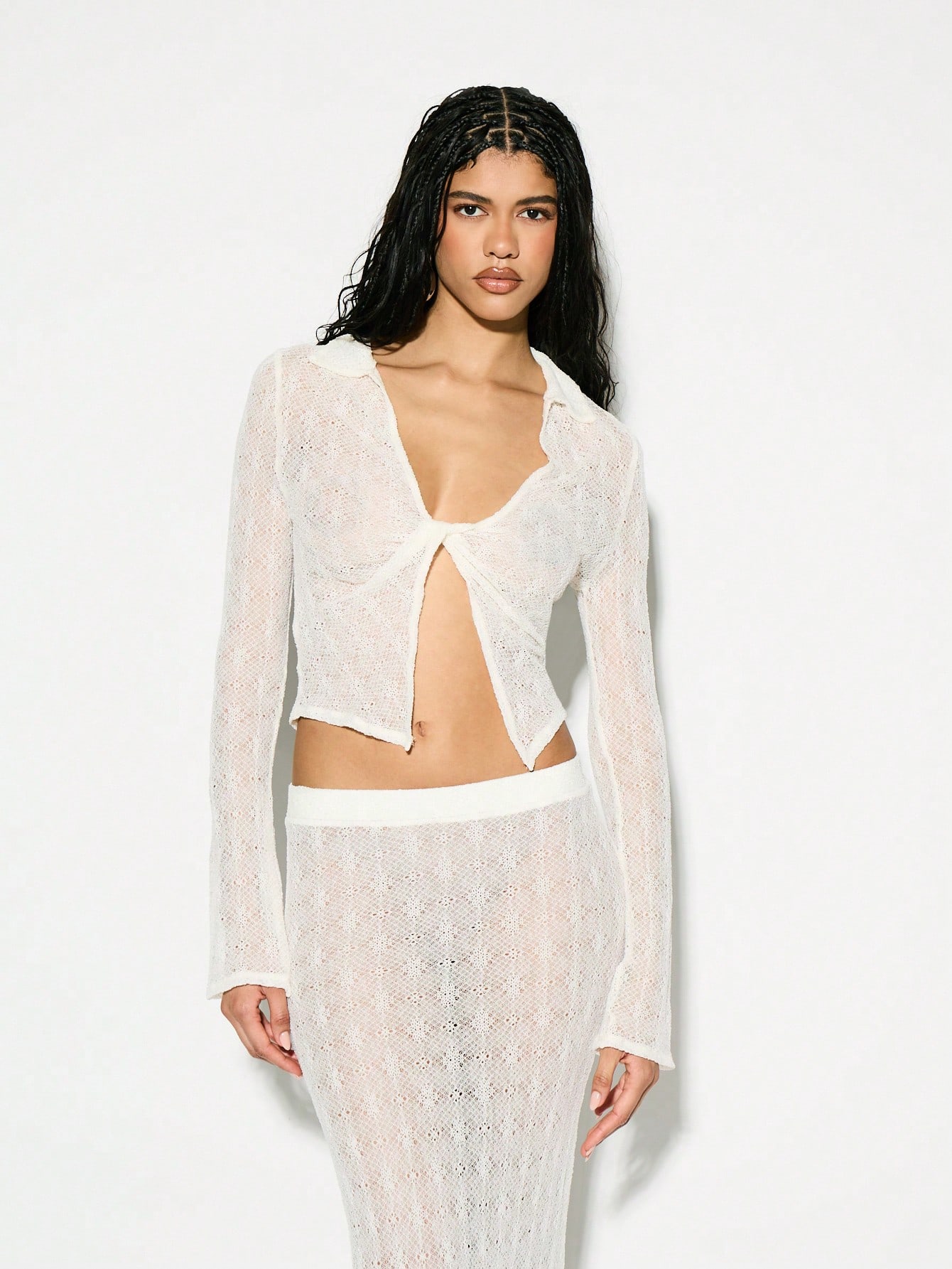 KIZN Long Sleeve Twist Front Open Crochet Sheer Crop Top