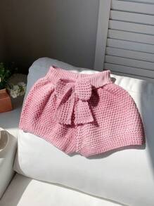 Comfortcana Shorts in stile vacanza al mare, a vita bassa, lavorati a maglia, con motivo a fiocco e design traforato