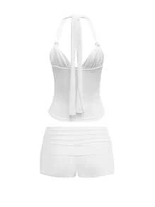 Conjunto de top sin espalda con cuello retorcido y pantalones cortos plisados a la cintura de unicolor y sexy