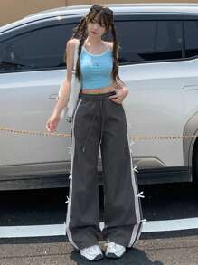 DAZY Pantaloni casual da donna con vita elastica, decorati con patchwork in pizzo e fiocco