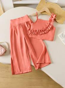 SHEIN Nuevo conjunto de moda de fiesta juvenil, incluye top sin mangas con volantes en tono rosa pálido y pantalones anchos de cintura alta, top con recorte floral + pantalones largos, conjunto asimétrico de hombro para playa y vacaciones para niña joven