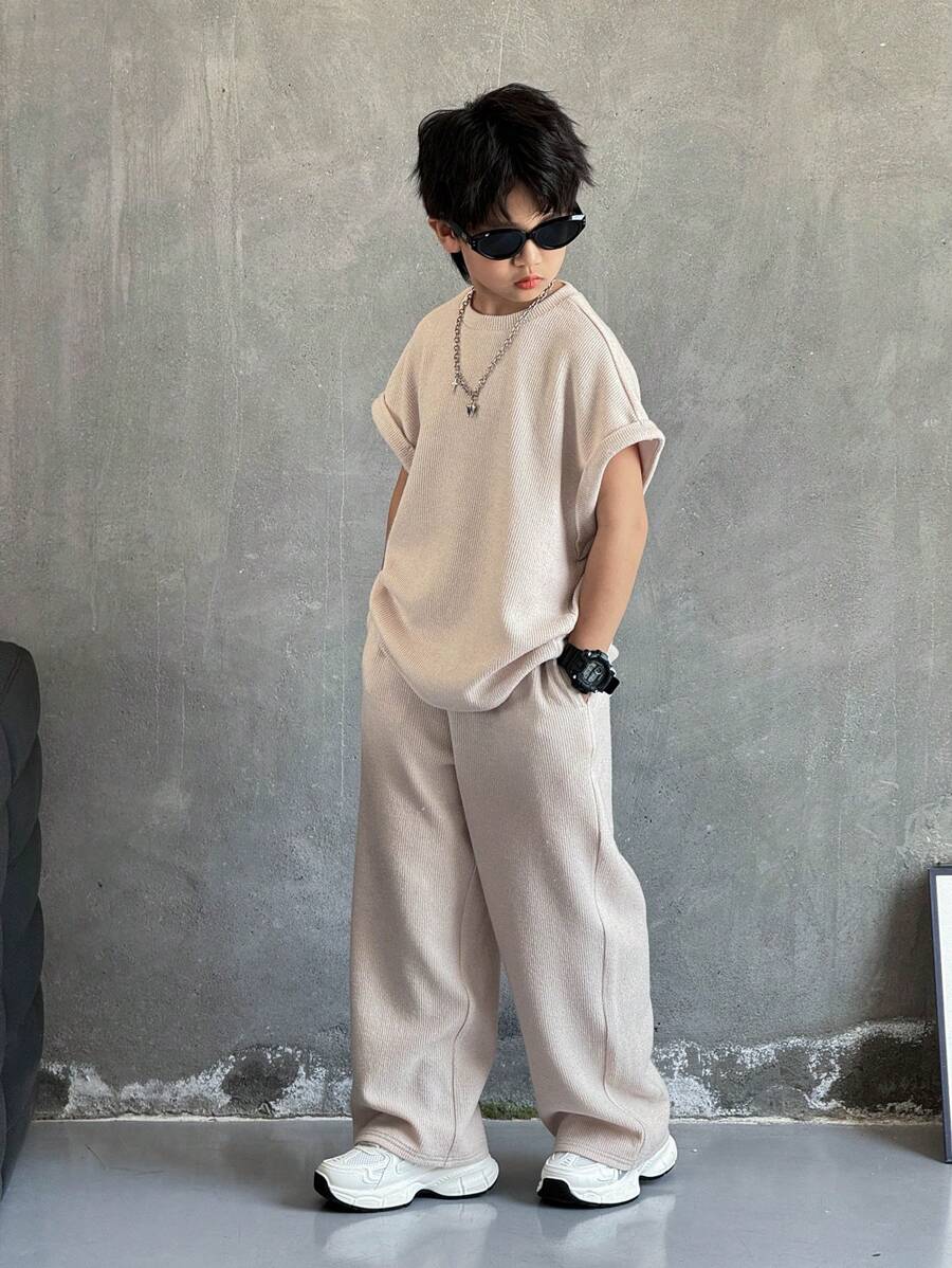 SHEIN 大童男孩韓系風格寬鬆米色背心與長褲套裝,夏季街頭風城市度假休閒校園運動穿搭,春夏假期穿著 - 杏色 - 查看 1