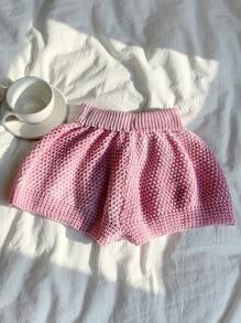 Comfortcana Shorts in stile vacanza al mare, a vita bassa, lavorati a maglia, con motivo a fiocco e design traforato