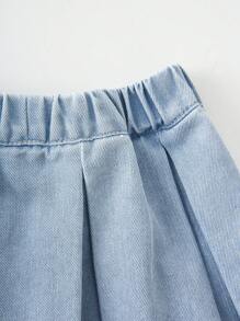 Chaleco vaquero holgado de lavado claro y falda vaquera plisada de cintura elástica completa para niña, conjunto versátil de moda minimalista para uso diario