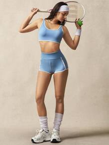 VARSITIE Sujetador deportivo con bloqueo de color azul y blanco y espalda con torsión y tirantes - Azul - Ver 6