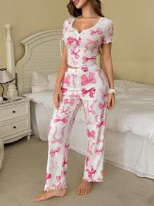 SHEIN Conjunto de pijama de punto con top de manga corta con cuello cuadrado de encaje y estampado de lazos rosas y pantalones
