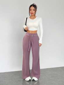 SHEIN EZwear Pantalones casuales ligeros lisos para mujeres, adecuados para el verano