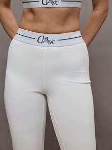 Activina Damen Hose mit Buchstaben-Muster und ausgestelltem Bein, Lässig & Fitness