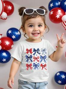 SHEIN Camiseta de manga corta para bebé niña con estampado de lunares y moños, de estilo casual y colorido - Blanco - Ver 1