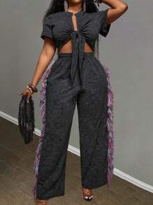 Slaydiva Conjunto de 2 piezas para mujer 2025 Nuevo, Vacaciones, Pascua, Graduación, Rave, Festival, Concierto, Fiesta de Cumpleaños, Casual Sexy: Top corto de manga corta con nudo delantero y pantalones largos holgados tipo maxi con bloques de color y flecos, Talla Grande Negro