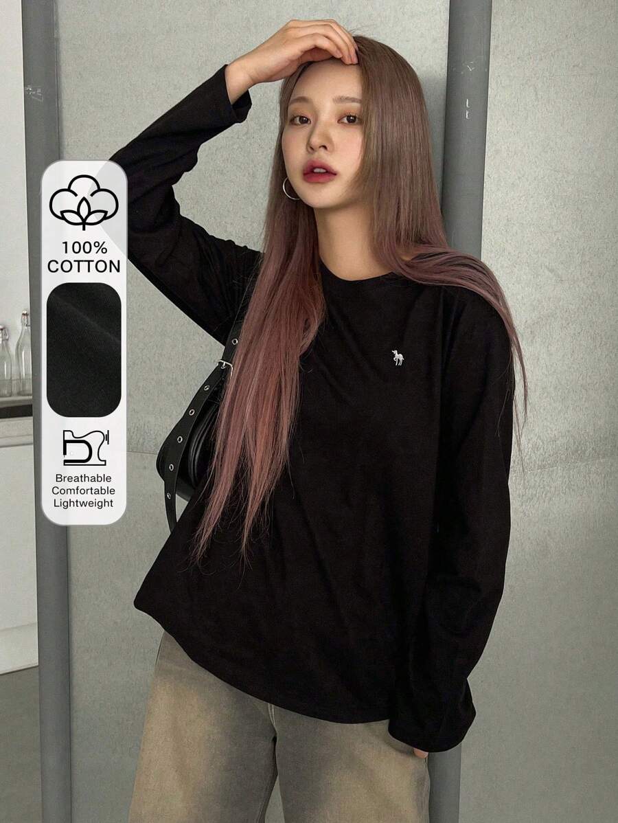 DAZY Camiseta de manga larga con gráfico de dibujos animados y hombros caídos, ropa de otoño para mujer - Negro - Ver 1