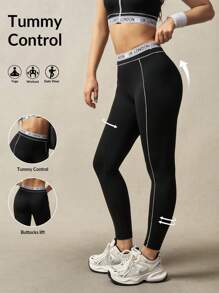 VARSIVA Women's High Waisted Letter Tape Contrast Trim Sports Leggings - Black and White - View 1