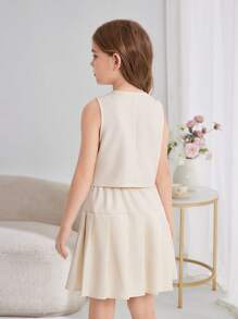 Conjunto de 2 piezas para chicas preadolescentes compuesto por top sin mangas de unicolor con botones asimétricos y falda plisada, color beige, ideal para volver al colegio, con estilo francés elegante y para ir de manera fashionable - Beis - Ver 15